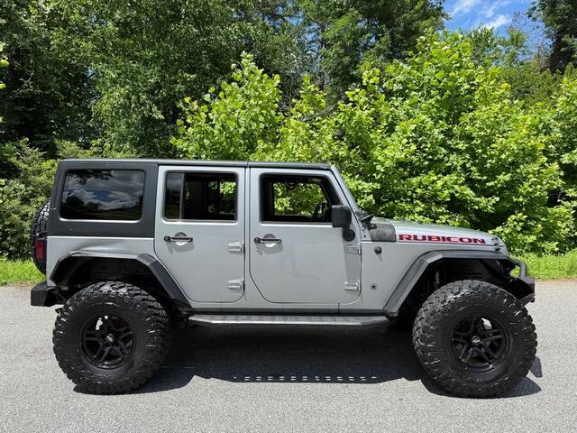 used 2014 Jeep Wrangler Unlimited car, priced at $20,999