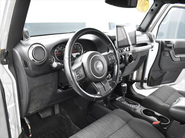 used 2011 Jeep Wrangler Unlimited car, priced at $13,000