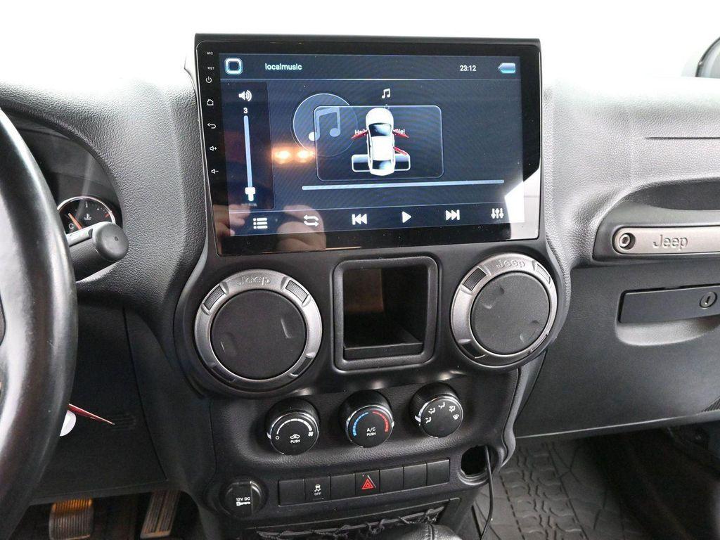 used 2015 Jeep Wrangler Unlimited car, priced at $16,800