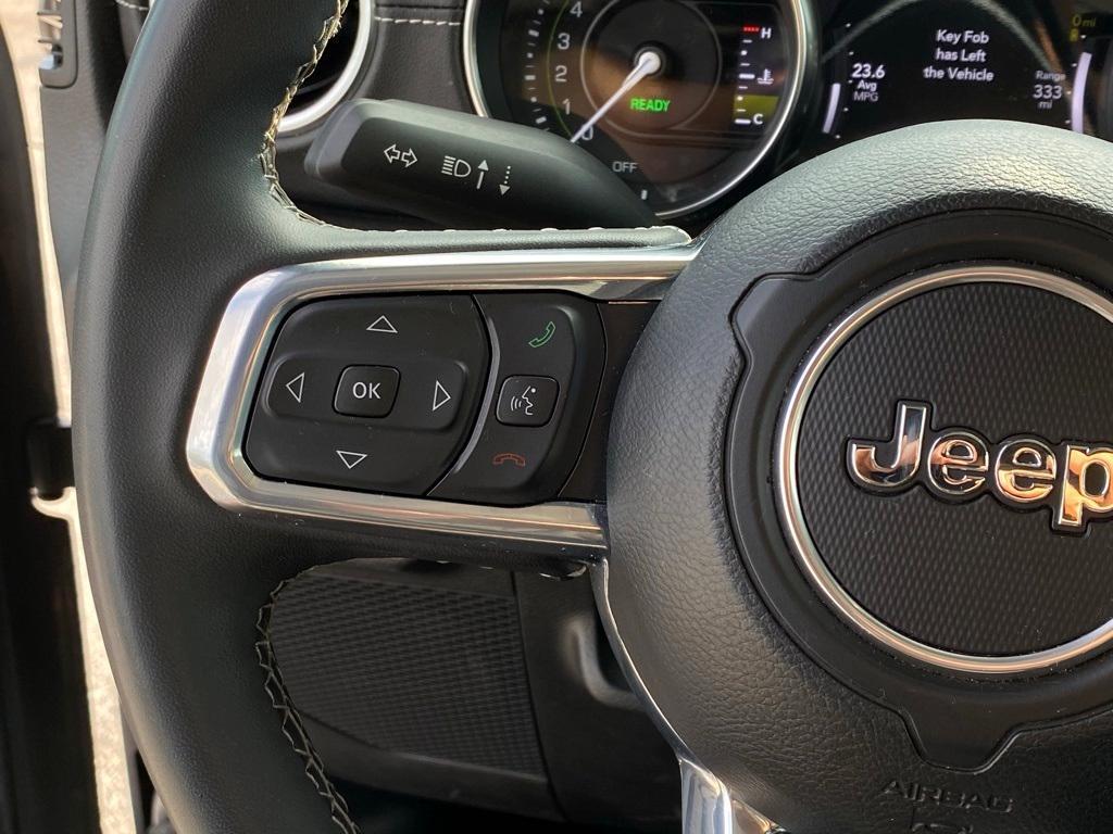 used 2023 Jeep Wrangler 4xe car, priced at $31,996