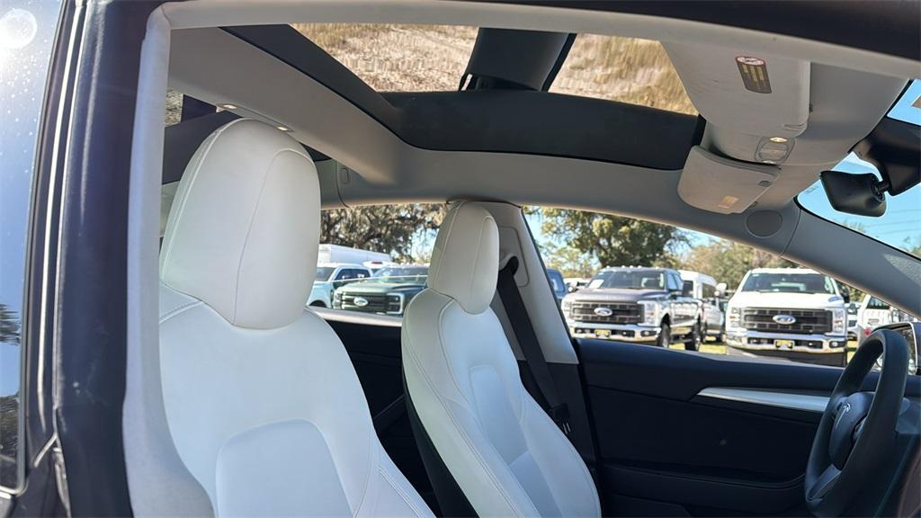 used 2022 Tesla Model 3 car, priced at $27,777