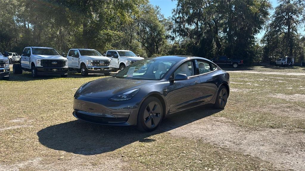 used 2022 Tesla Model 3 car, priced at $27,777