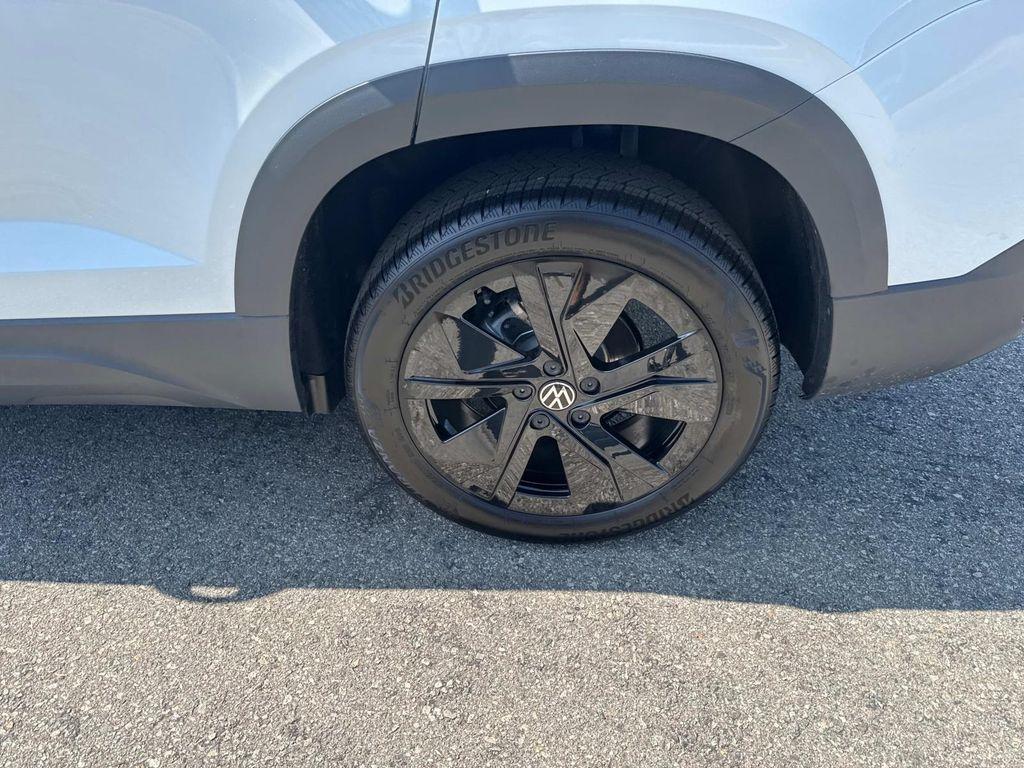 new 2025 Volkswagen Taos car, priced at $29,998