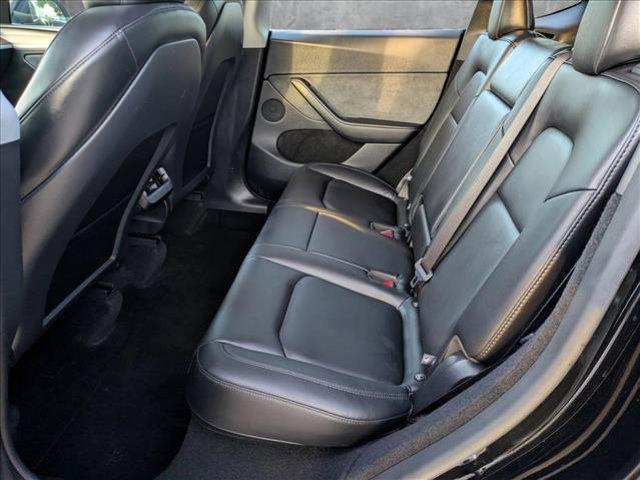 used 2025 Tesla Model Y car, priced at $38,809