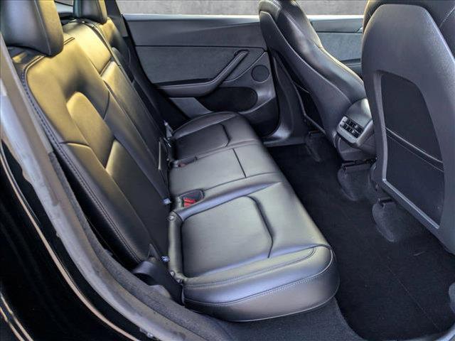 used 2025 Tesla Model Y car, priced at $38,809