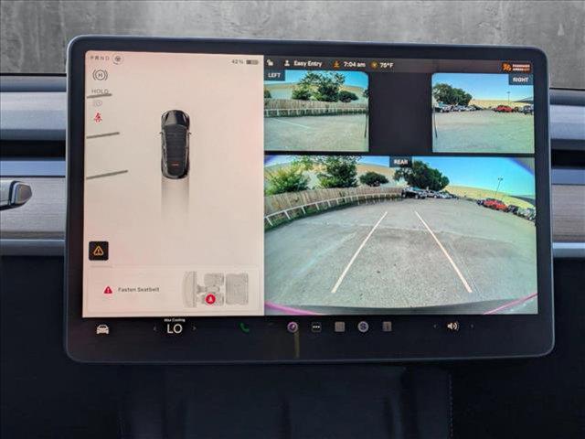 used 2025 Tesla Model Y car, priced at $38,809