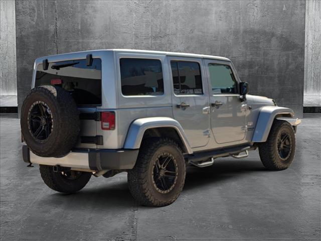 used 2013 Jeep Wrangler Unlimited car, priced at $15,998