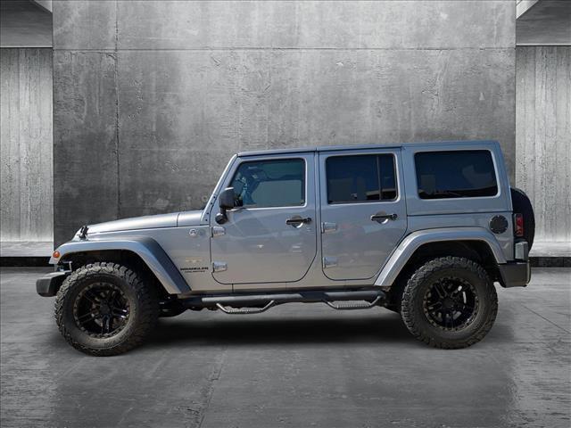 used 2013 Jeep Wrangler Unlimited car, priced at $15,998