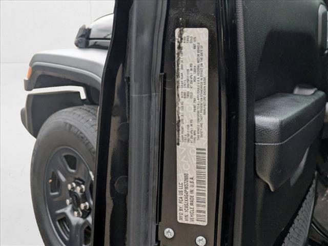 used 2023 Jeep Wrangler car, priced at $27,645