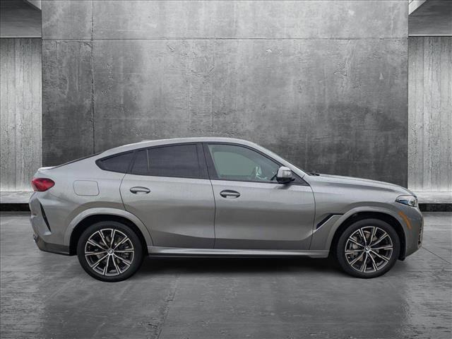 used 2025 BMW X6 car, priced at $63,495