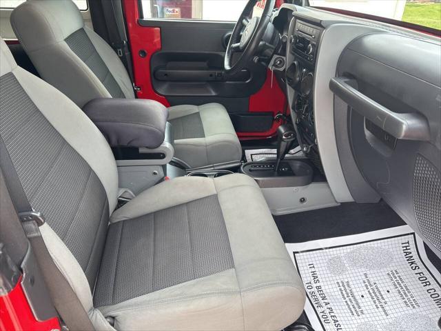 used 2010 Jeep Wrangler car, priced at $13,997