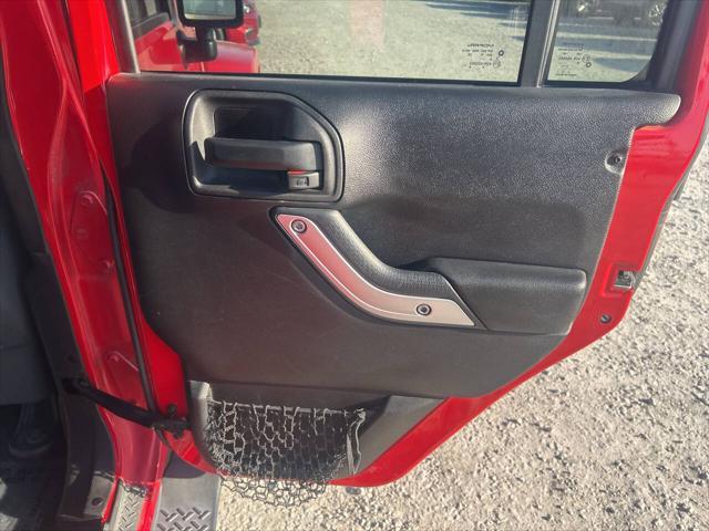 used 2014 Jeep Wrangler Unlimited car, priced at $19,997