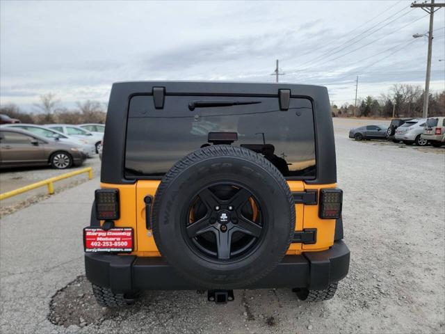 used 2012 Jeep Wrangler Unlimited car, priced at $16,925