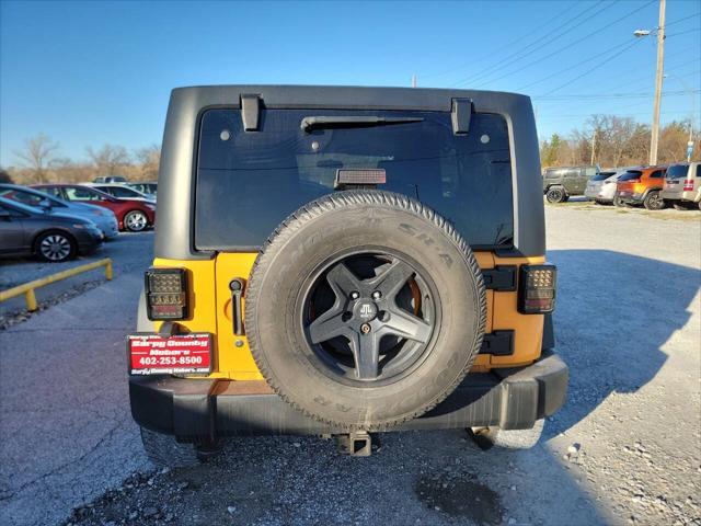 used 2012 Jeep Wrangler Unlimited car, priced at $17,997