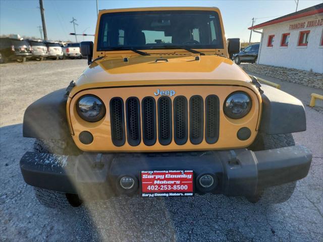 used 2012 Jeep Wrangler Unlimited car, priced at $17,997