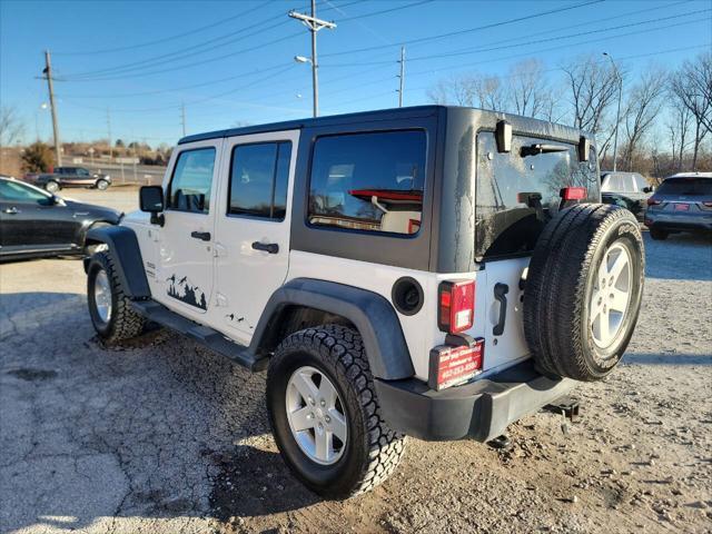 used 2013 Jeep Wrangler Unlimited car, priced at $18,997