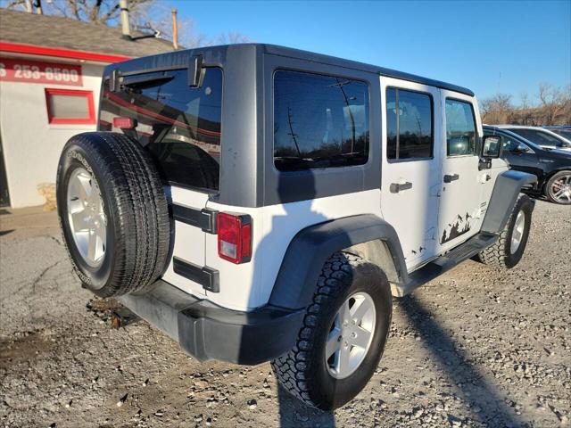 used 2013 Jeep Wrangler Unlimited car, priced at $18,997