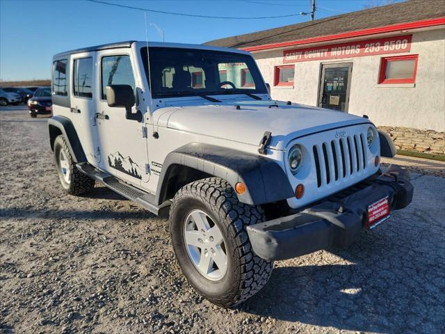 used 2013 Jeep Wrangler Unlimited car, priced at $18,997