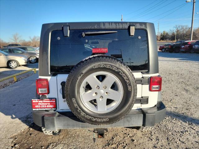 used 2013 Jeep Wrangler Unlimited car, priced at $18,997