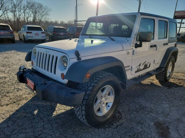 used 2013 Jeep Wrangler Unlimited car, priced at $18,997