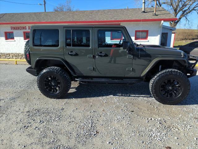 used 2015 Jeep Wrangler Unlimited car, priced at $17,929