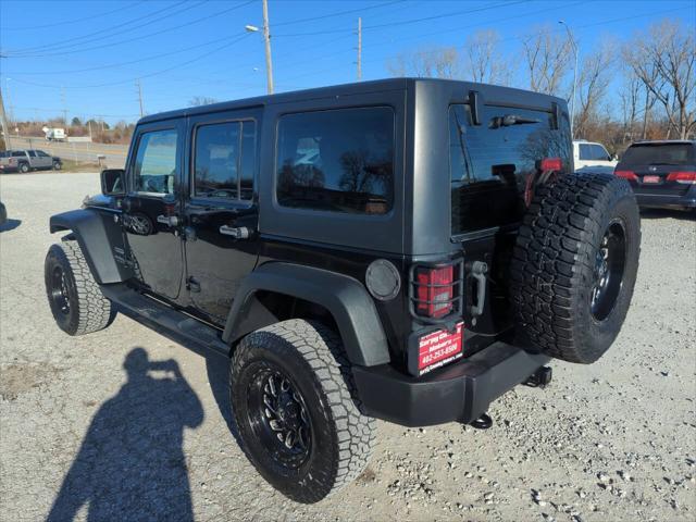 used 2015 Jeep Wrangler Unlimited car, priced at $18,925