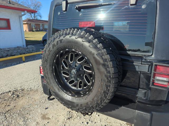 used 2015 Jeep Wrangler Unlimited car, priced at $18,925