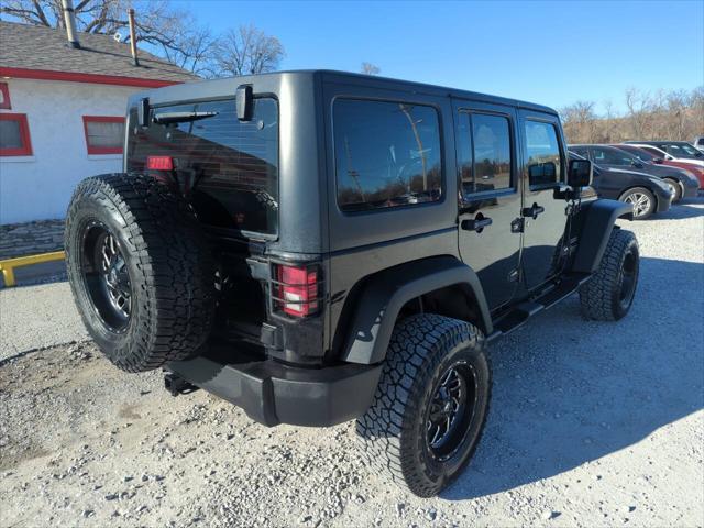 used 2015 Jeep Wrangler Unlimited car, priced at $18,925