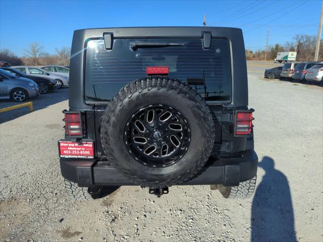 used 2015 Jeep Wrangler Unlimited car, priced at $18,925