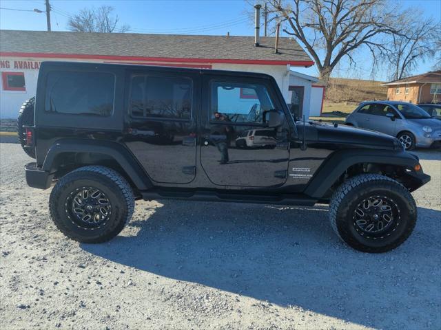 used 2015 Jeep Wrangler Unlimited car, priced at $18,925