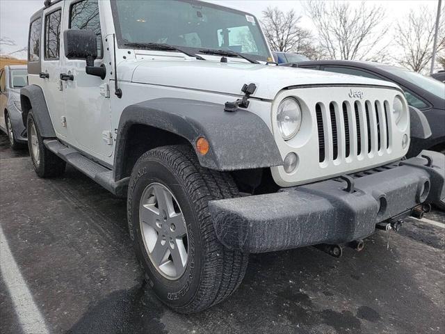 used 2014 Jeep Wrangler Unlimited car, priced at $19,997