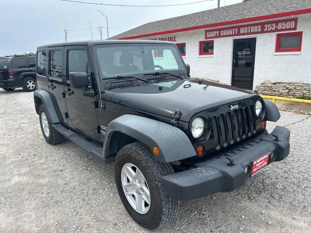 used 2011 Jeep Wrangler Unlimited car, priced at $18,997