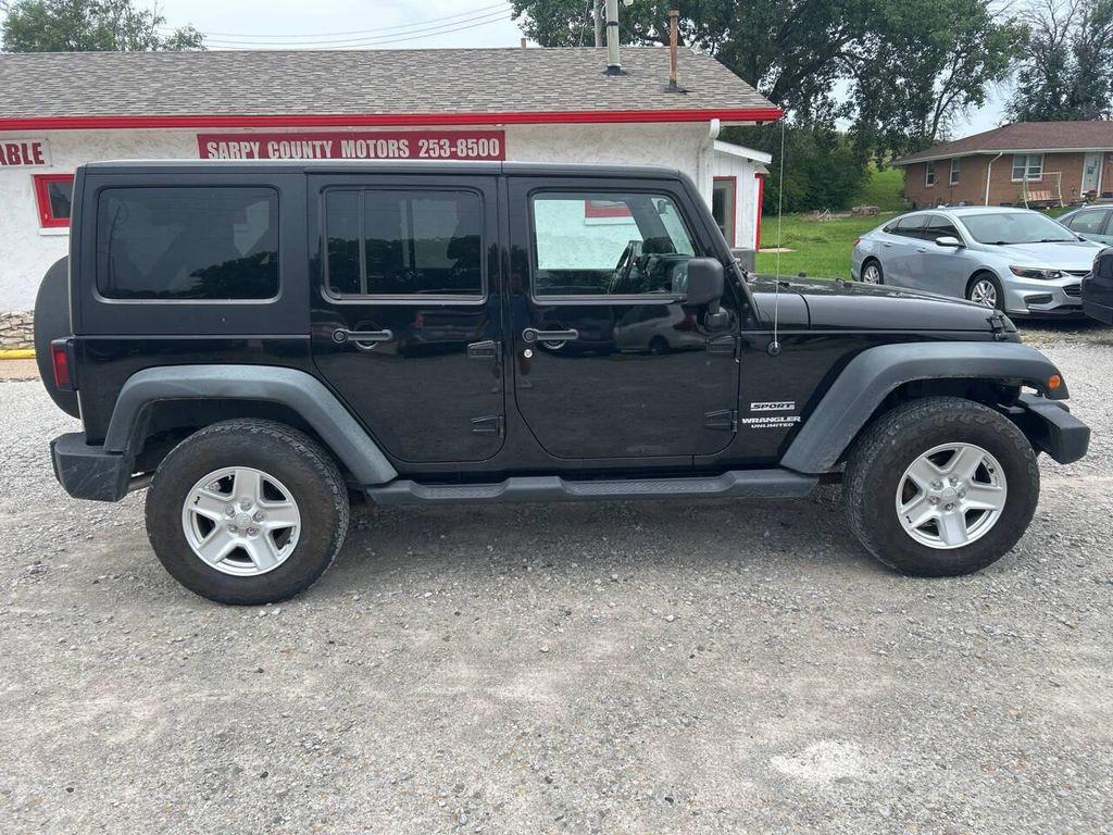 used 2011 Jeep Wrangler Unlimited car, priced at $18,997