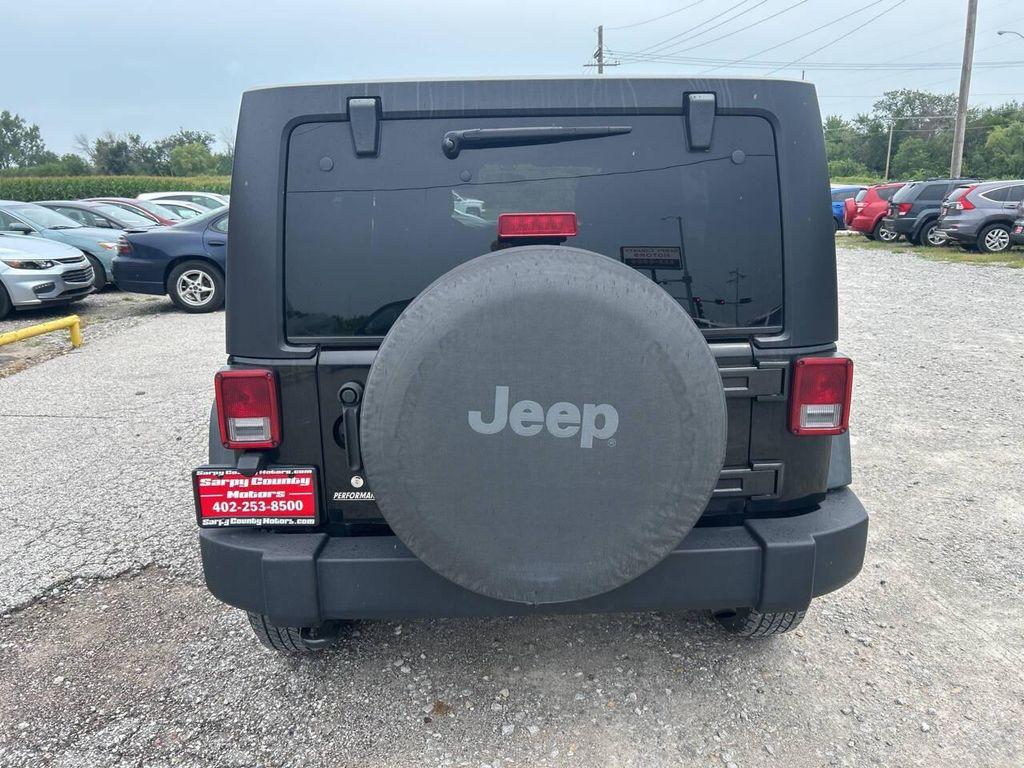 used 2011 Jeep Wrangler Unlimited car, priced at $18,997