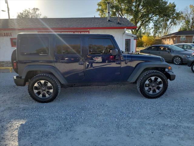 used 2013 Jeep Wrangler Unlimited car, priced at $19,929