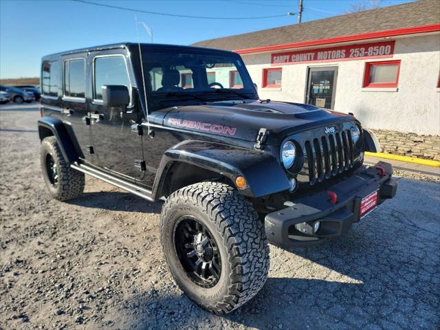 used 2015 Jeep Wrangler Unlimited car, priced at $25,997