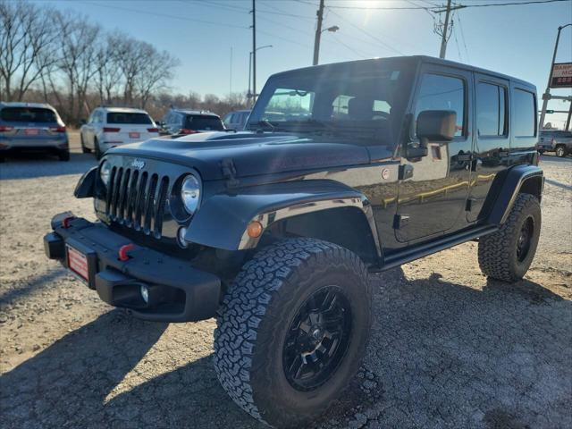 used 2015 Jeep Wrangler Unlimited car, priced at $25,997