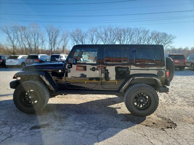 used 2015 Jeep Wrangler Unlimited car, priced at $25,997