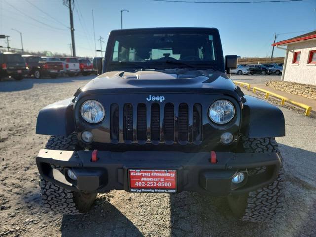 used 2015 Jeep Wrangler Unlimited car, priced at $25,997