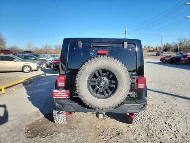 used 2015 Jeep Wrangler Unlimited car, priced at $25,997