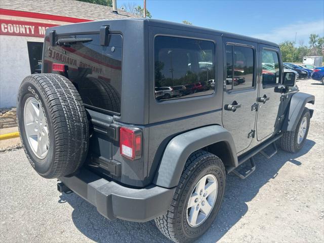 used 2018 Jeep Wrangler JK Unlimited car, priced at $22,931