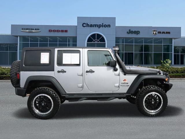 used 2018 Jeep Wrangler JK Unlimited car, priced at $23,998