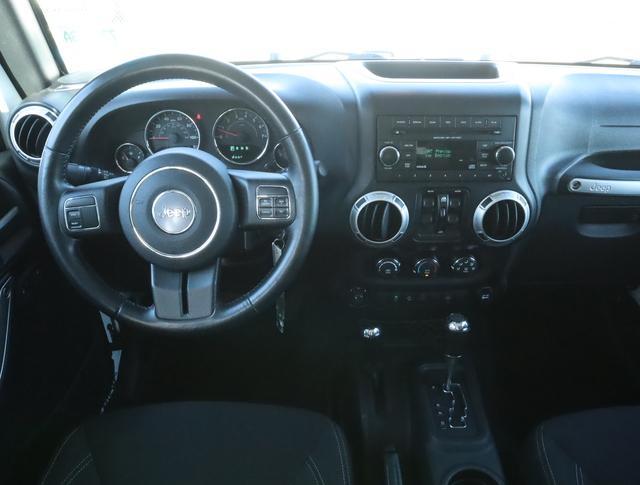 used 2015 Jeep Wrangler Unlimited car, priced at $16,998