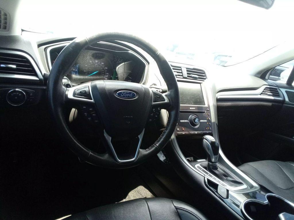 used 2016 Ford Fusion car, priced at $7,499