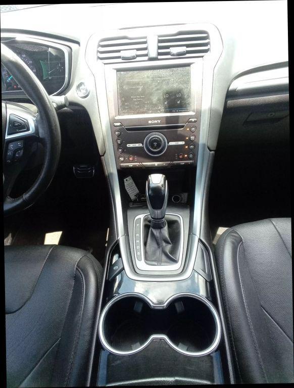 used 2016 Ford Fusion car, priced at $7,499