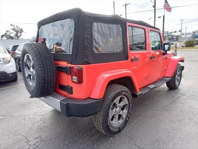 used 2013 Jeep Wrangler Unlimited car, priced at $12,999