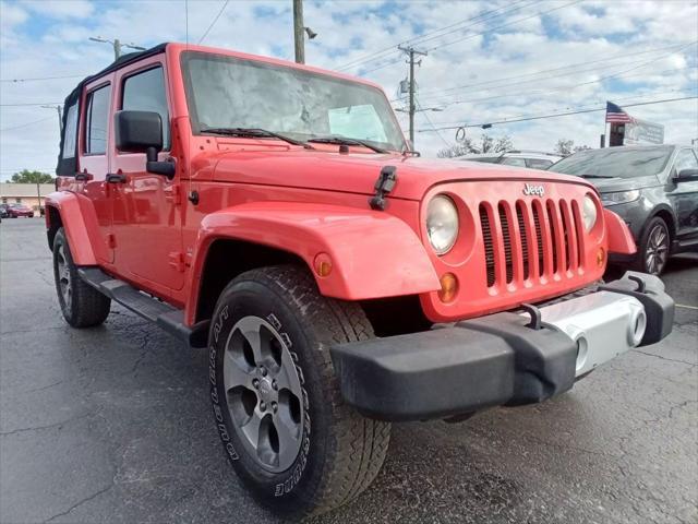 used 2013 Jeep Wrangler Unlimited car, priced at $12,999