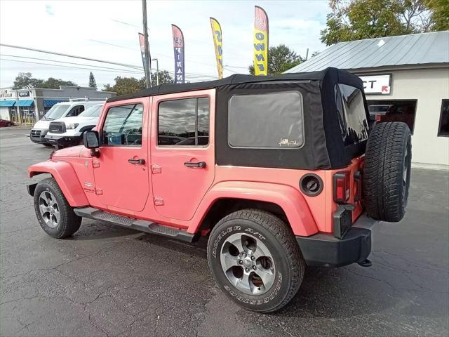 used 2013 Jeep Wrangler Unlimited car, priced at $12,999