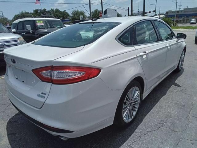 used 2014 Ford Fusion car, priced at $7,999