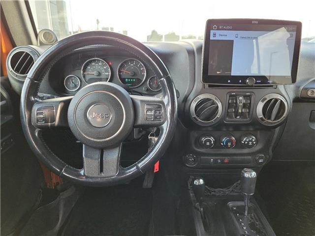used 2011 Jeep Wrangler Unlimited car, priced at $16,985